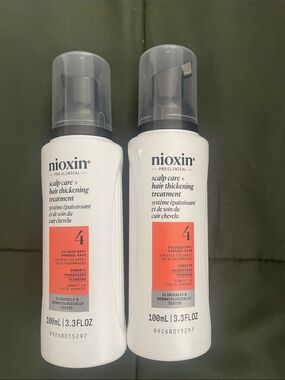 Nioxin Pro Clinical Scalp Care + Hair Thickening Treatment (White & Coral)